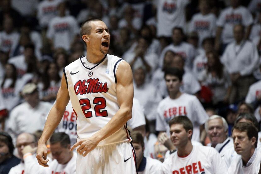In this Tuesday, Jan. 29, 2013, photo, Mississippi guard Marshall Henderson reacts to fans...