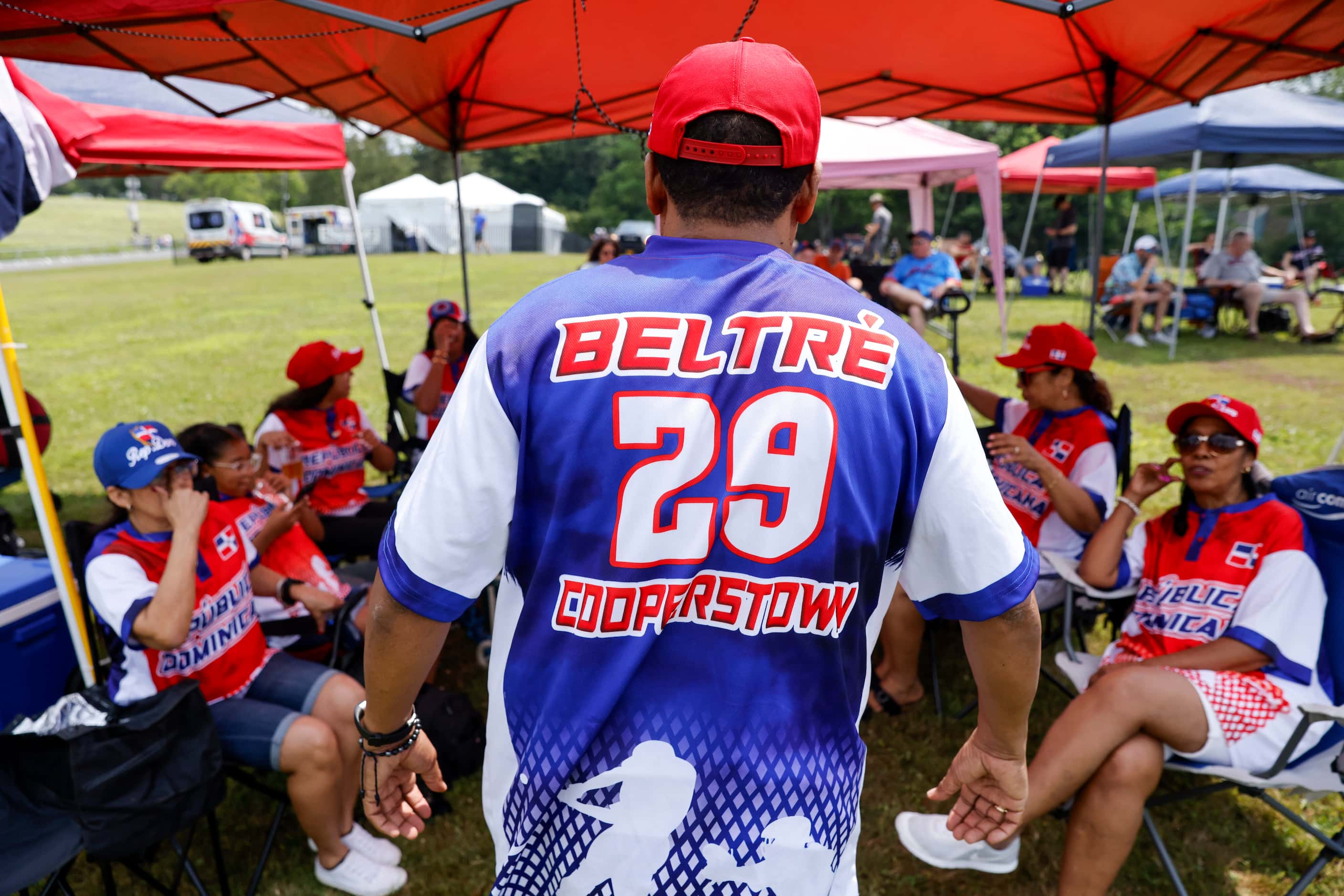 Wilton Perez shows off his Adrián Beltré Cooperstown shirt before the National Baseball Hall...