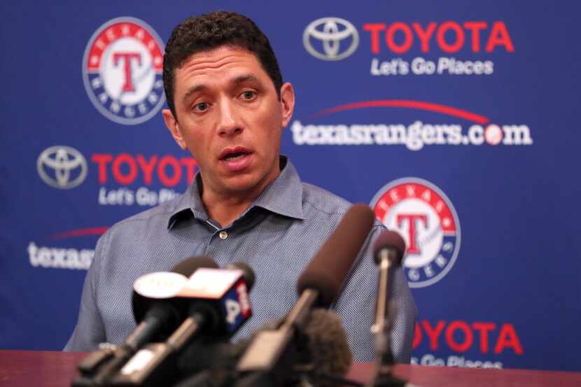 ARLINGTON, TEXAS - JULY 01: Texas Rangers General Manager Jon Daniels talks with the media...