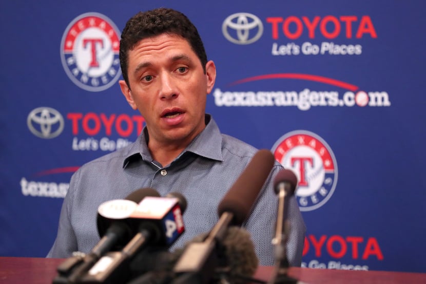 ARLINGTON, TEXAS - JULY 01: Texas Rangers General Manager Jon Daniels talks with the media...