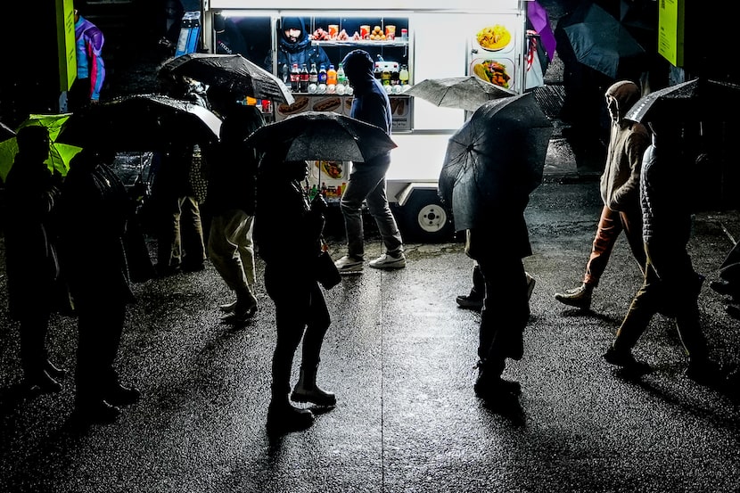 People wait in line to enter the Whitney Museum of American Art, Friday, Nov. 22, 2024, in...