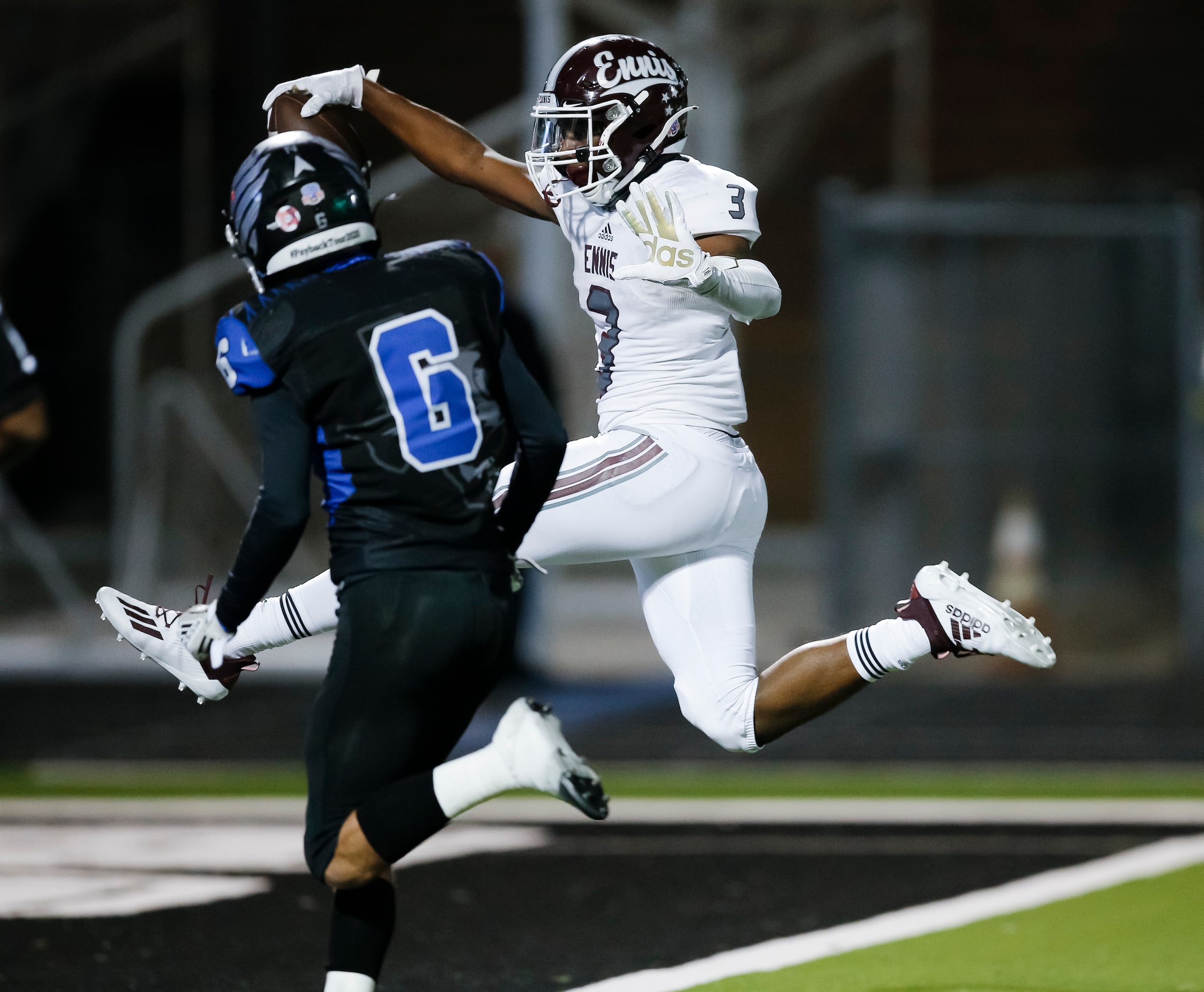 Ennis junior running back De?ivian Johnson (3) scores a touchdown as North Forney senior...