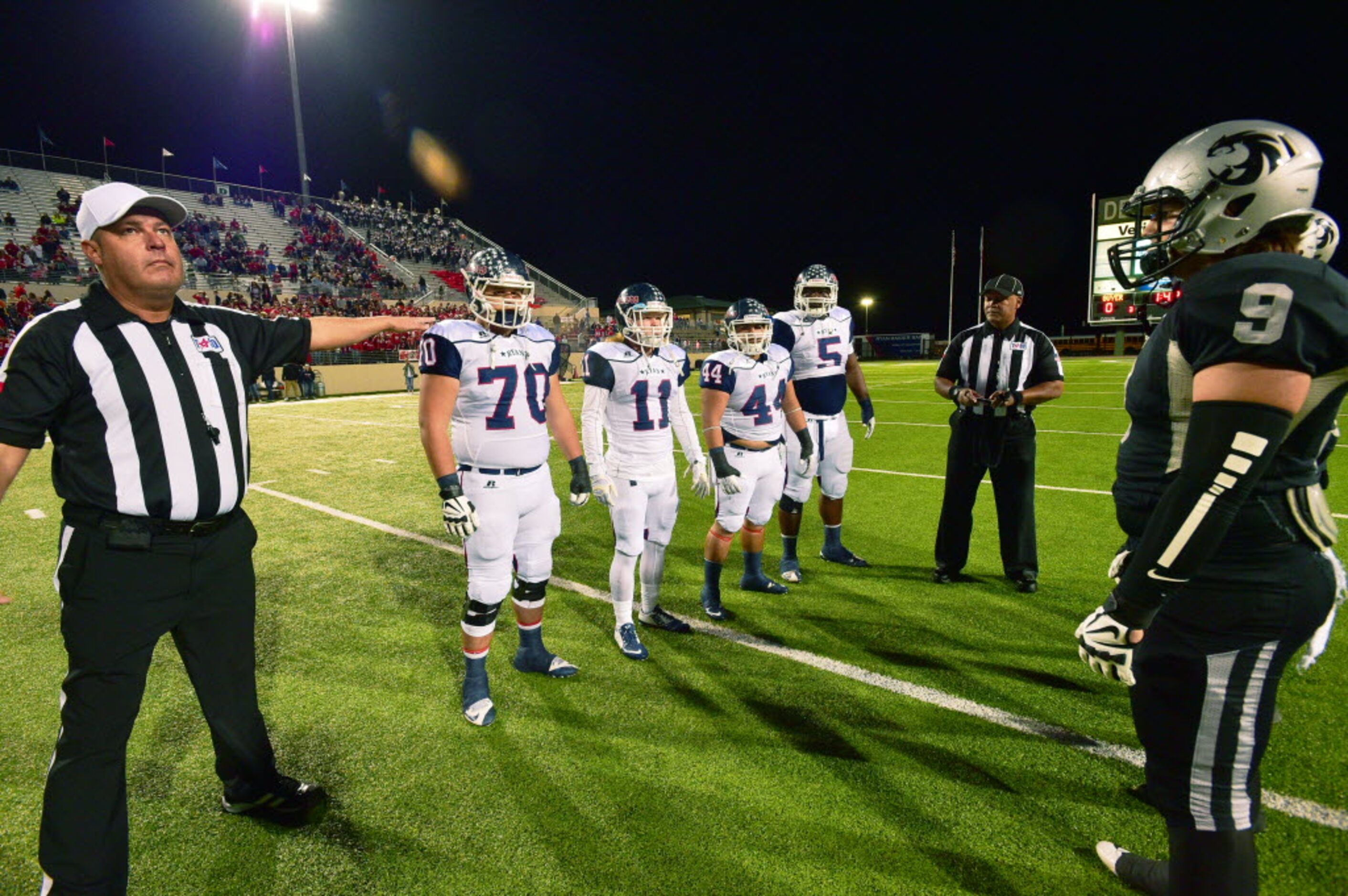 Ryan wins the coin toss before kickoff against Guyer, Friday, November 6, 2015, at C.H....