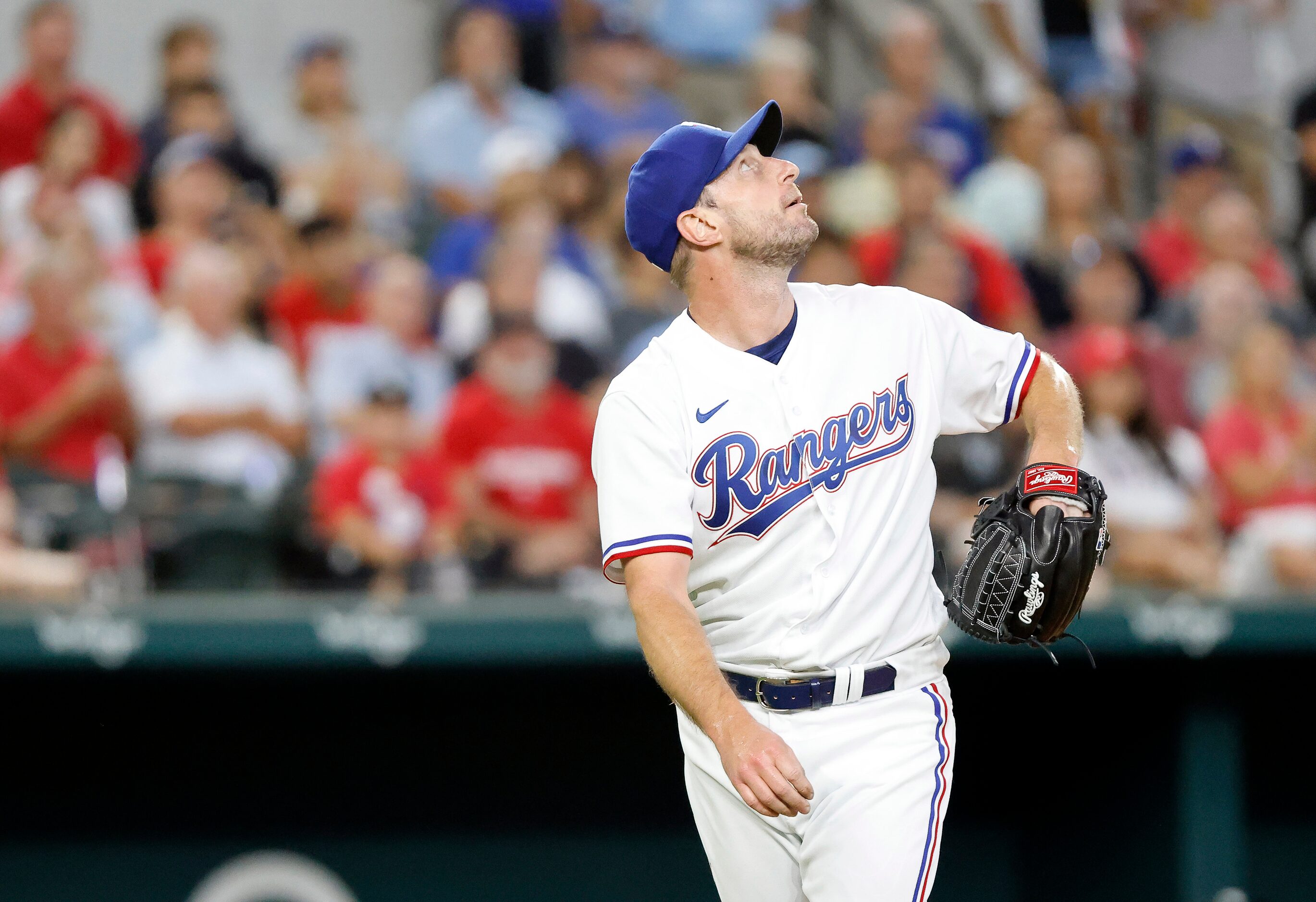 Texas Rangers starting pitcher Max Scherzer (31) watches the final out of the sixth inning,...