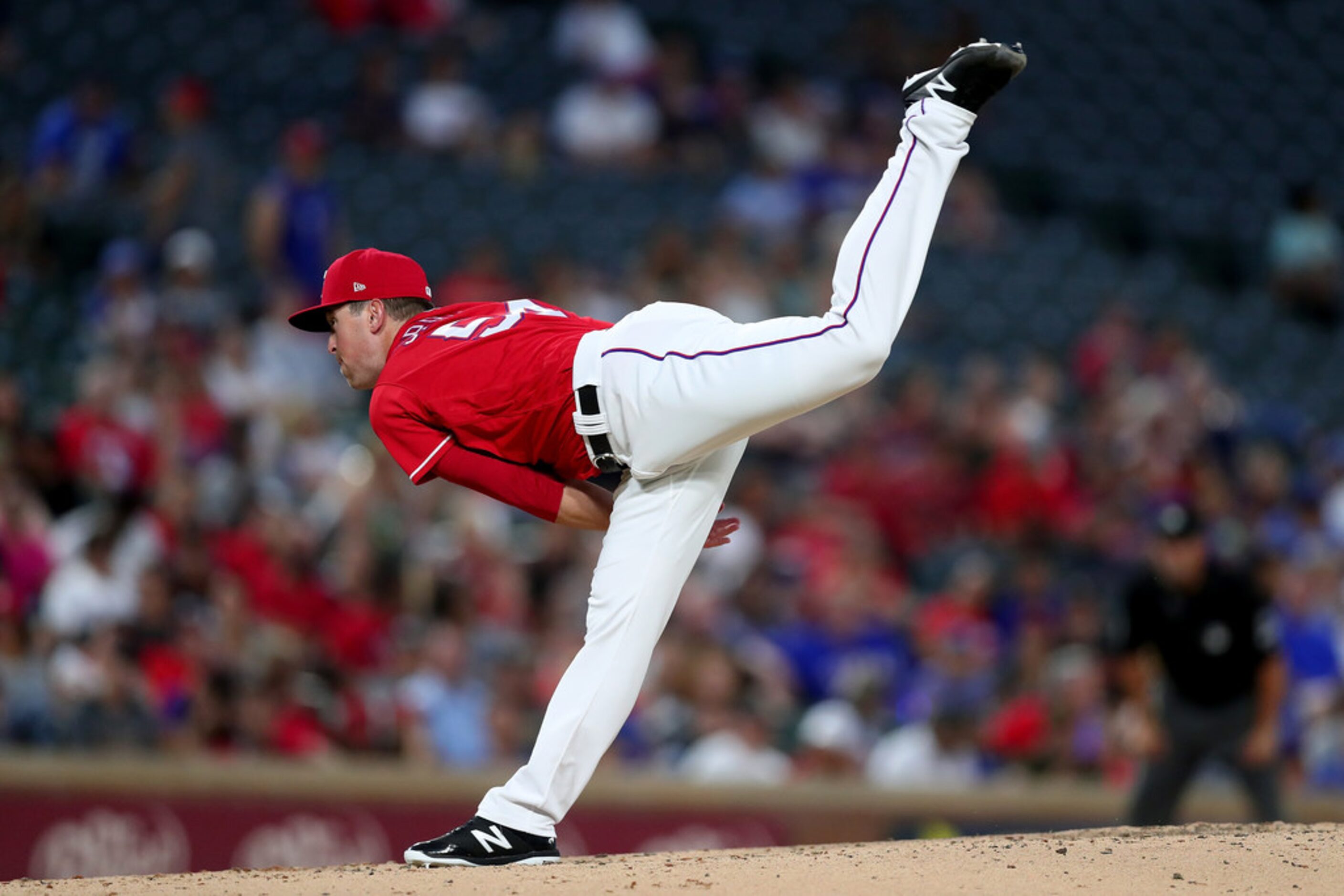 ARLINGTON, TX - AUGUST 14:  Jeffrey Springs #54 of the Texas Rangers pitches against the...