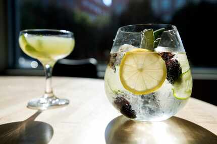 Sachet's bar menu includes a 130 spritzer (left) and a Hendrick's gin and tonic.