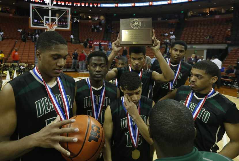 Desoto players Terry Maston (31),Kenneth White (30), Cedrick Gray (15),  Devin Wyatt (20),...