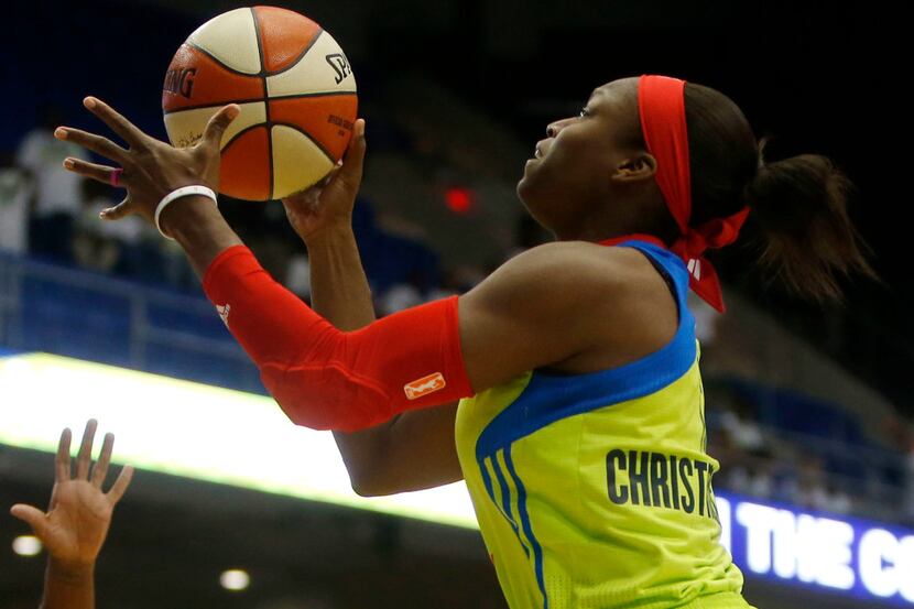 Dallas Wings guard Karima Christmas (13) lays up a shot against the Minnesota Lynx in the...