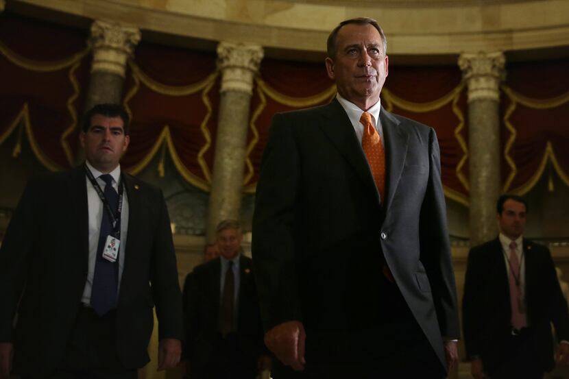 WASHINGTON, DC - OCTOBER 16:  U.S. Speaker of the House Rep. John Boehner (R-OH) walks to...