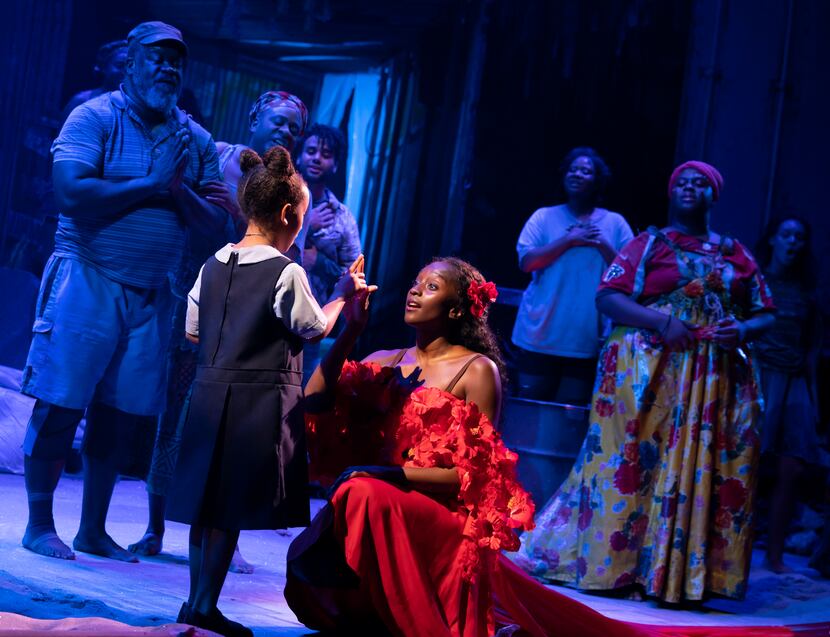Mimi Crossland as the Little Girl and Courtnee Carter as Ti Moune in the North American tour...