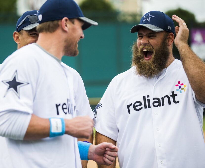 FILE - Dallas Cowboys tight end Jason Witten (82) jokes with center Travis Frederick (72)...