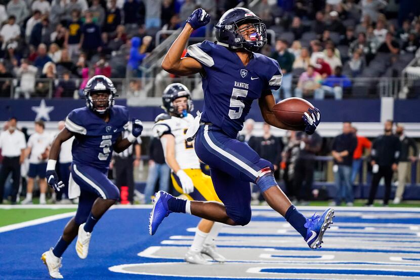 Frisco Lone Star running back Jaden Nixon celebrates as goes into the end zone on an 18-yard...