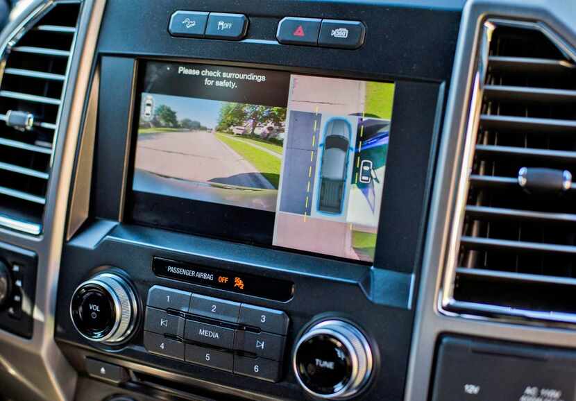 
A touch screen in Tim Wiford’s 2015 Ford F150 Platinum pickup truck shows a 360-degree view...
