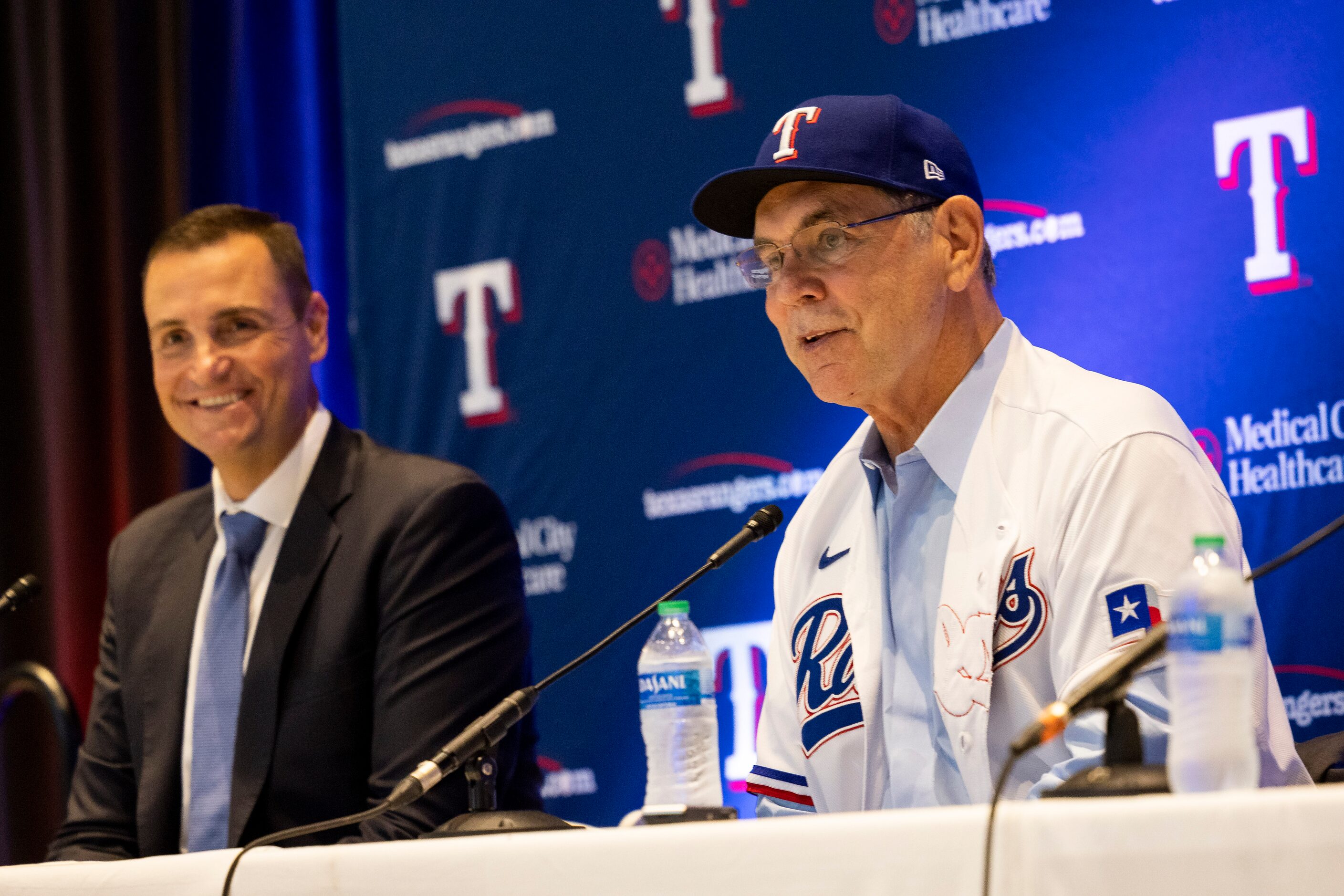 New Texas Rangers manager Bruce Bochy speaks during a press conference as Chris Young...