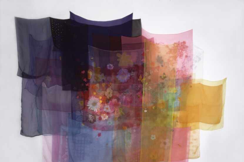 With the Wind, from 1997, is composed of scarves and thread.