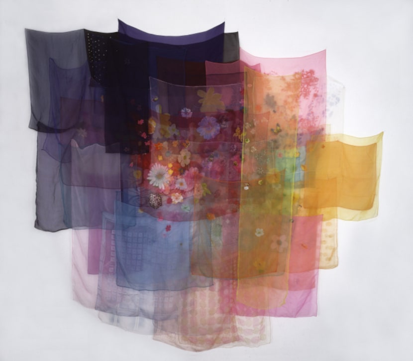 With the Wind, from 1997, is composed of scarves and thread.