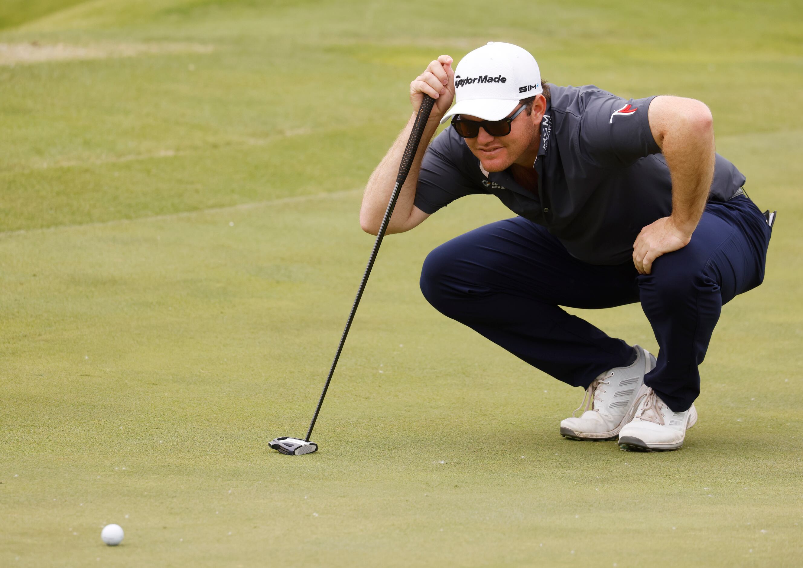 Harry Higgs exams his putt on the 6th hole during round 2 of the AT&T Byron Nelson  at TPC...