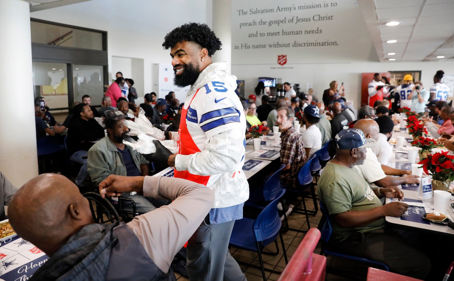 Dallas Cowboys running back Ezekiel Elliott (15) and other veteran players served an “Early”...