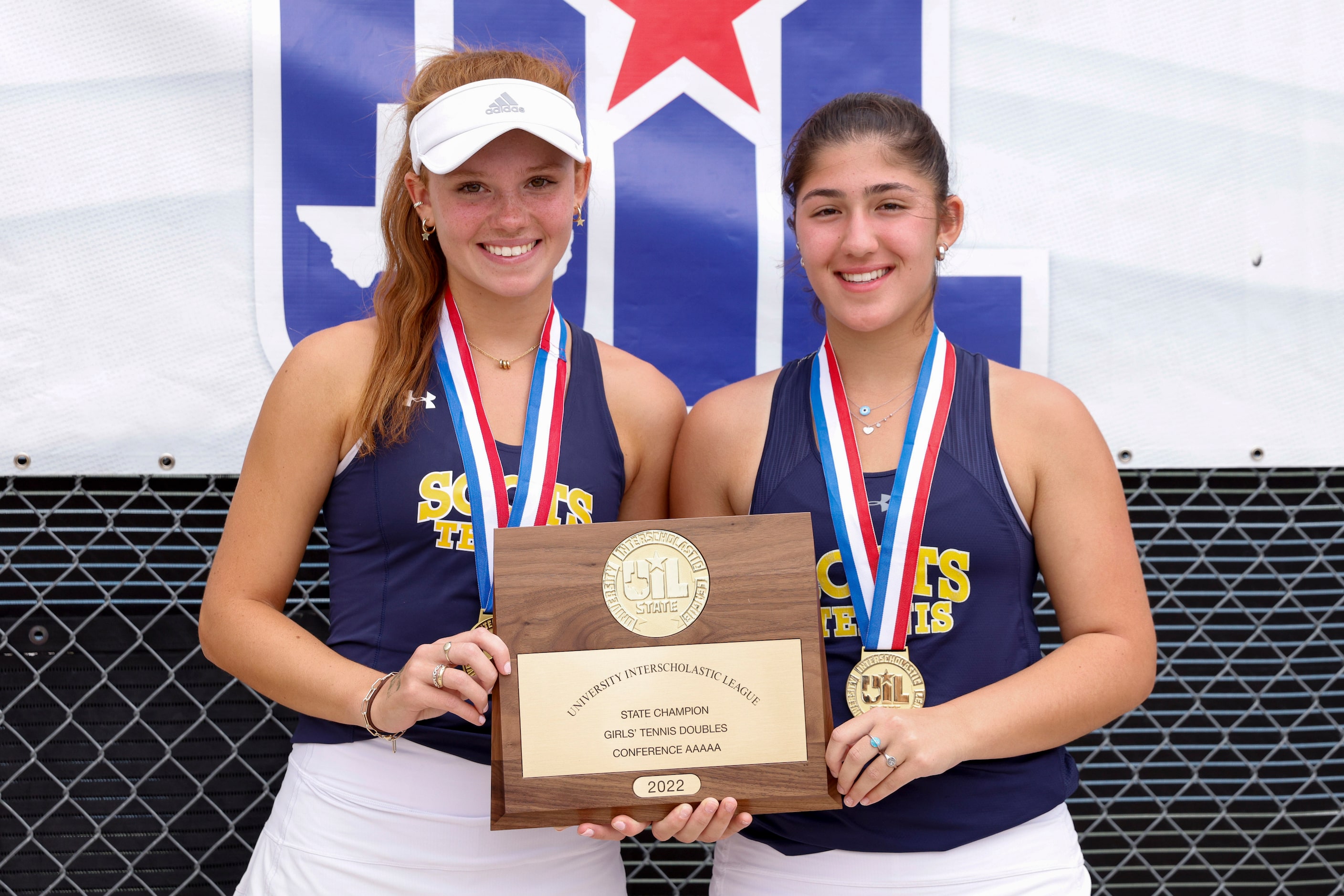 Highland Park’s Isabella McElfresh (left) and Eden Rogozinski pose with their 5A girls...