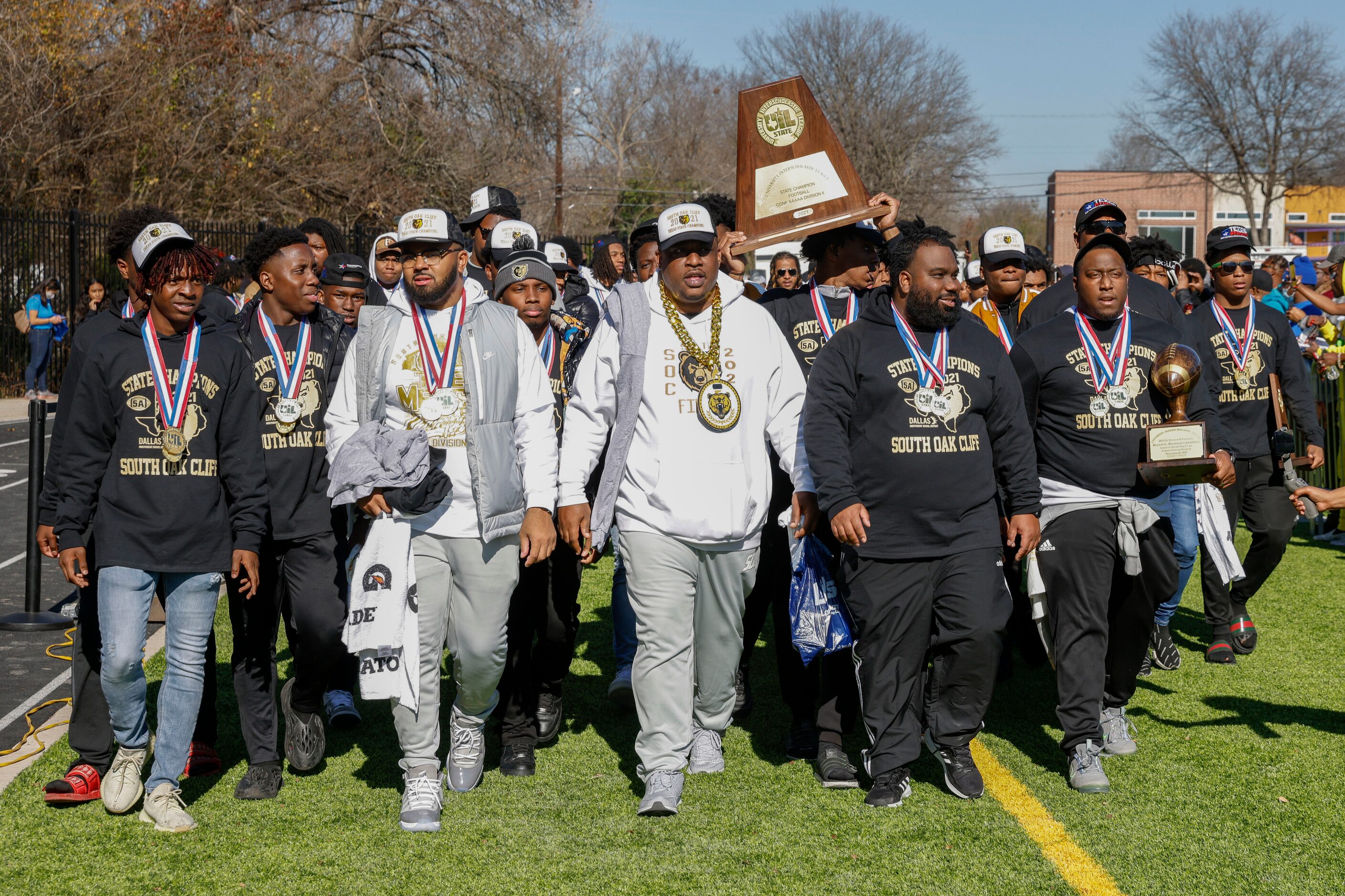 South Oak Cliff head coach Jason Todd leads the South Oak Cliff team to the stage before a...