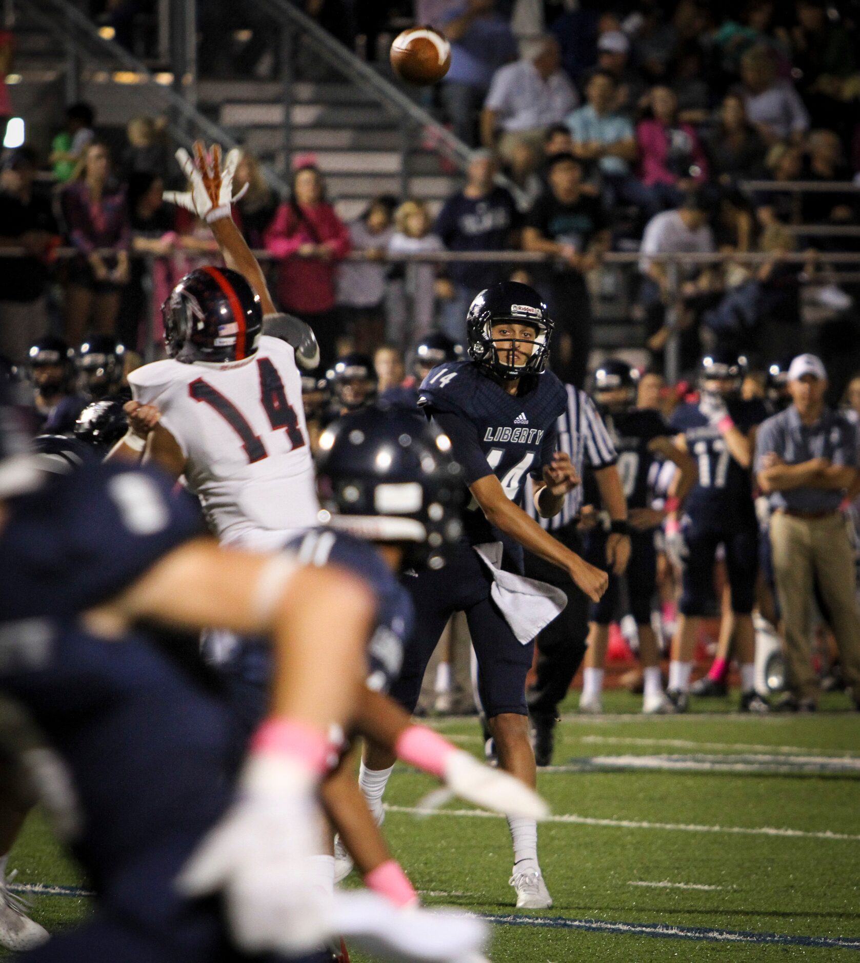 Argyle Liberty quarterback Nick Starkel (14) passes the ball during the football game...