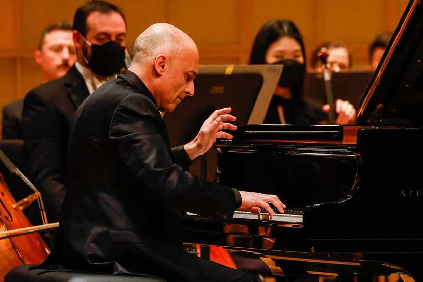 Italian pianist Benedetto Lupo performs Mozart's Piano Concerto No. 23 in A Major with the...