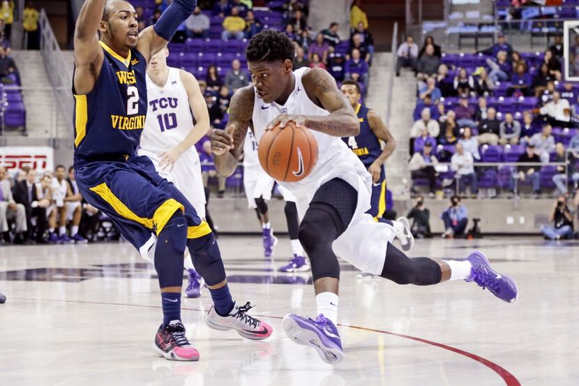 Jan 4, 2016; Fort Worth, TX, USA; TCU Horned Frogs guard Chauncey Collins (1) drives to the...