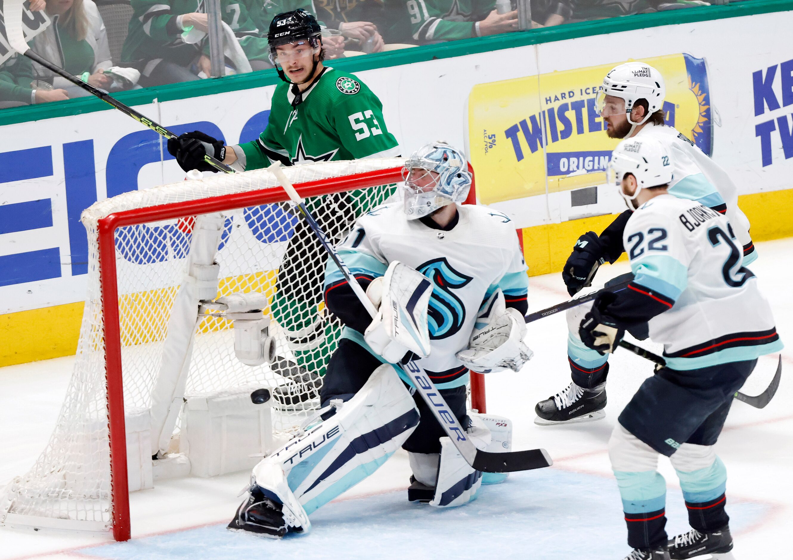 Dallas Stars center Wyatt Johnston (53) scores on Seattle Kraken goaltender Philipp Grubauer...