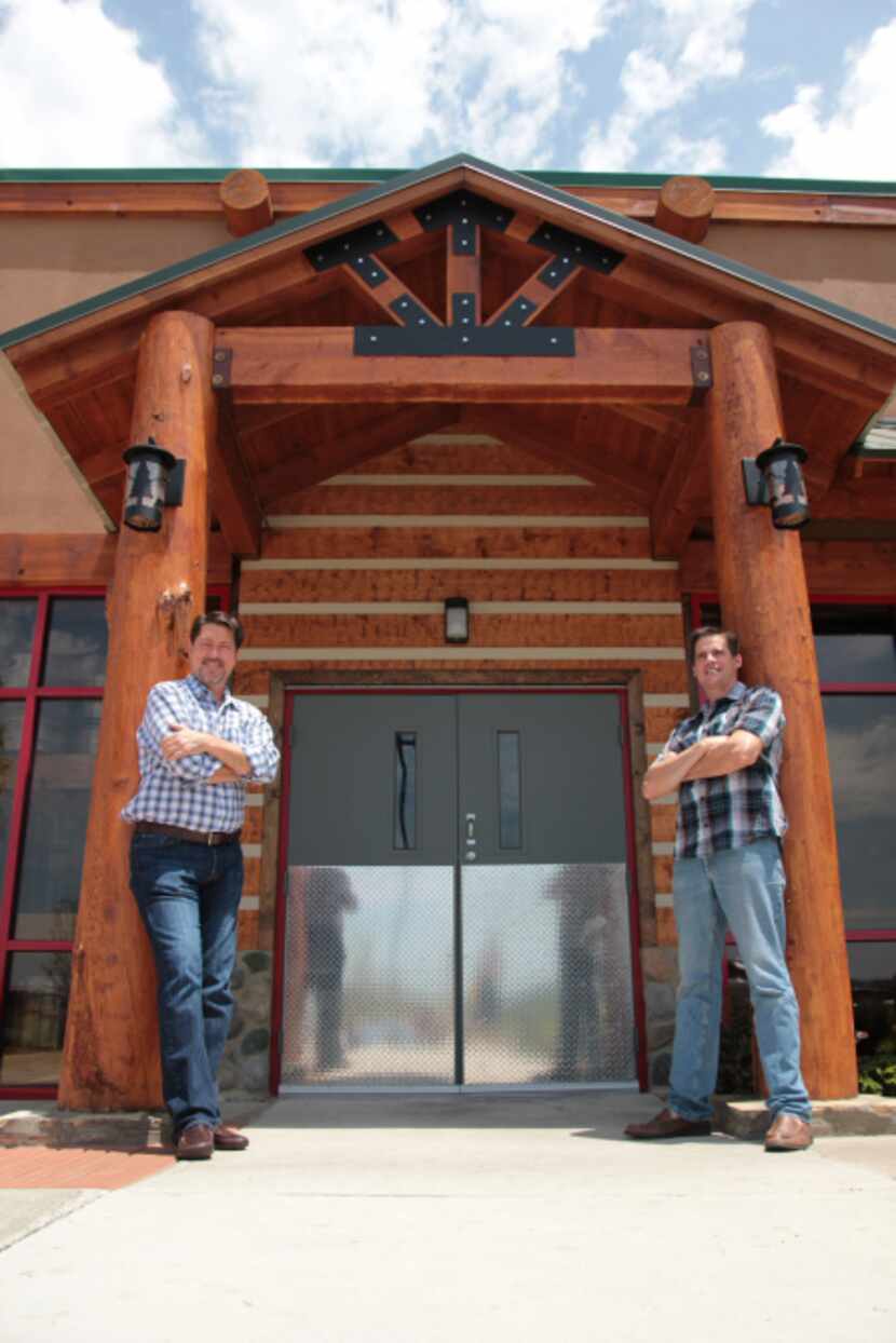 Twin Peaks CEO Randy DeWitt (left) and brewmaster Tom Janik stand in front of the north...