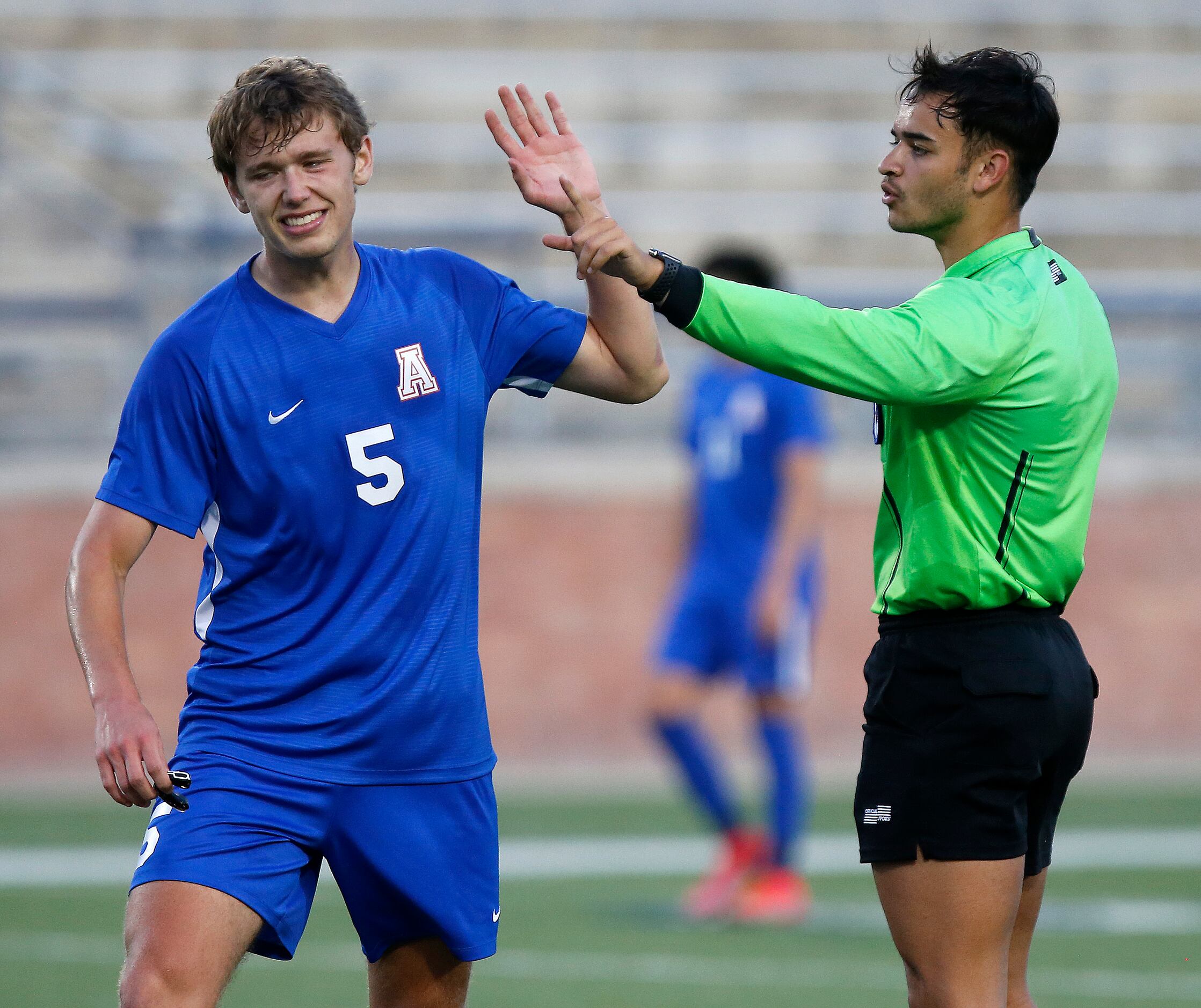 Allen defender Greysen Golgert (5) disgrees with a foul called against him during the first...