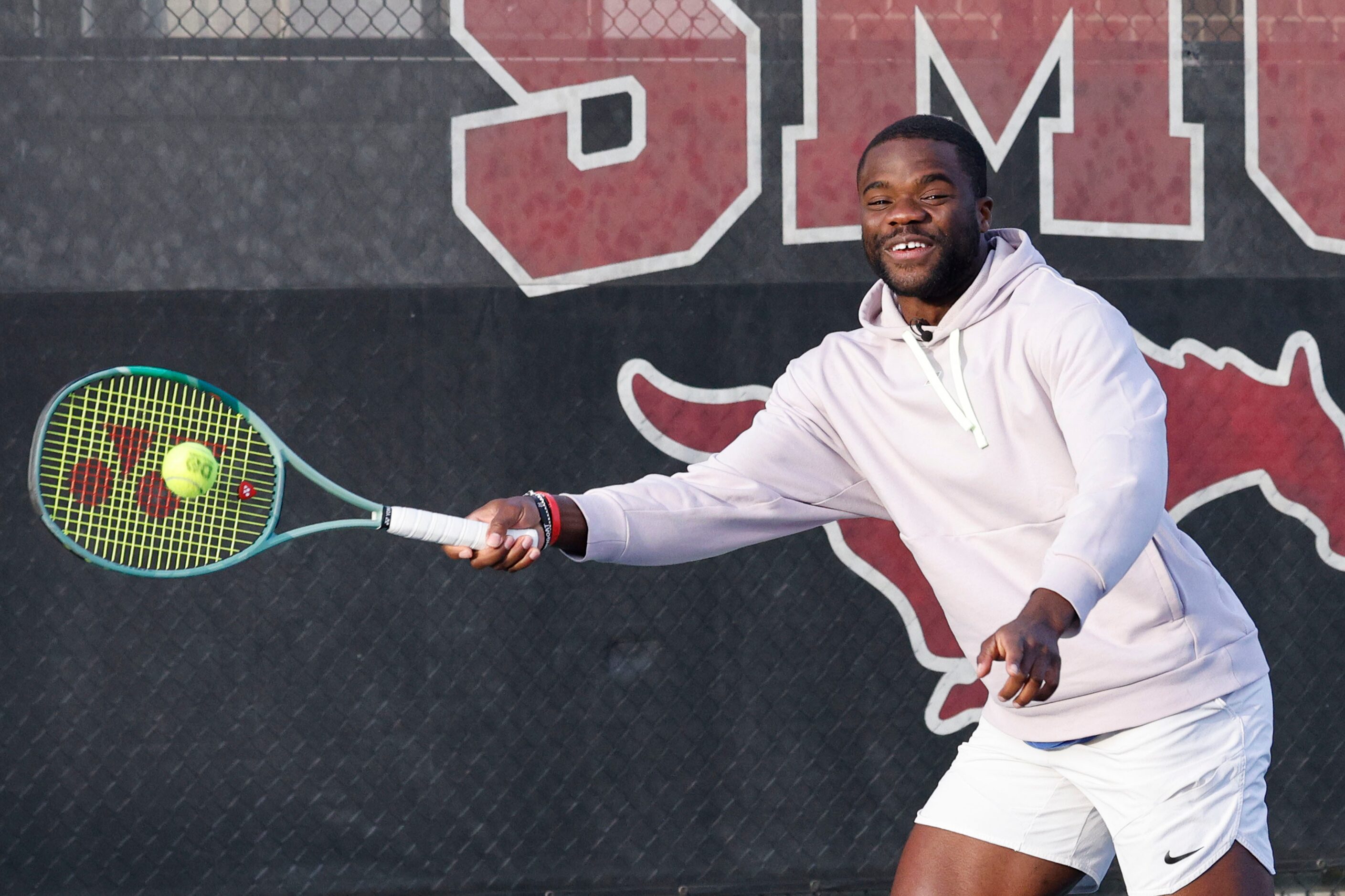 American tennis star Frances Tiafoe plays with students from Dallas Tennis Education Academy...