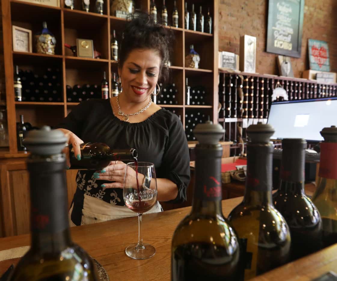 Lydia Olivarri pours some wine at Landon Winery.