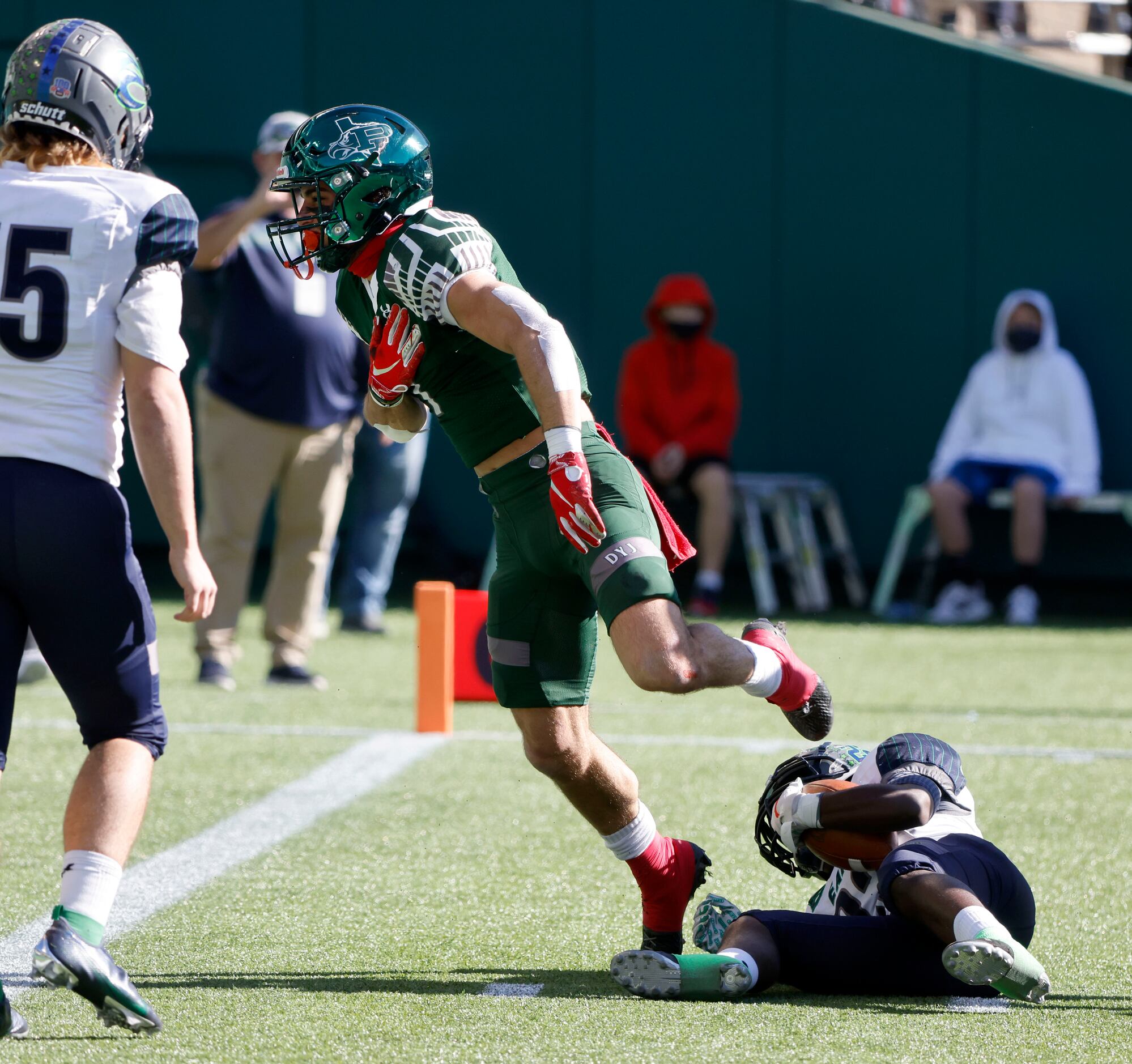 Prosper defender Mason Jolley (7) reacts after stopping Northwest Eaton running back Jahbez...