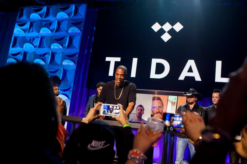 Jay Z signs a manifesto about the future of the Tidal music service, at Monday's...