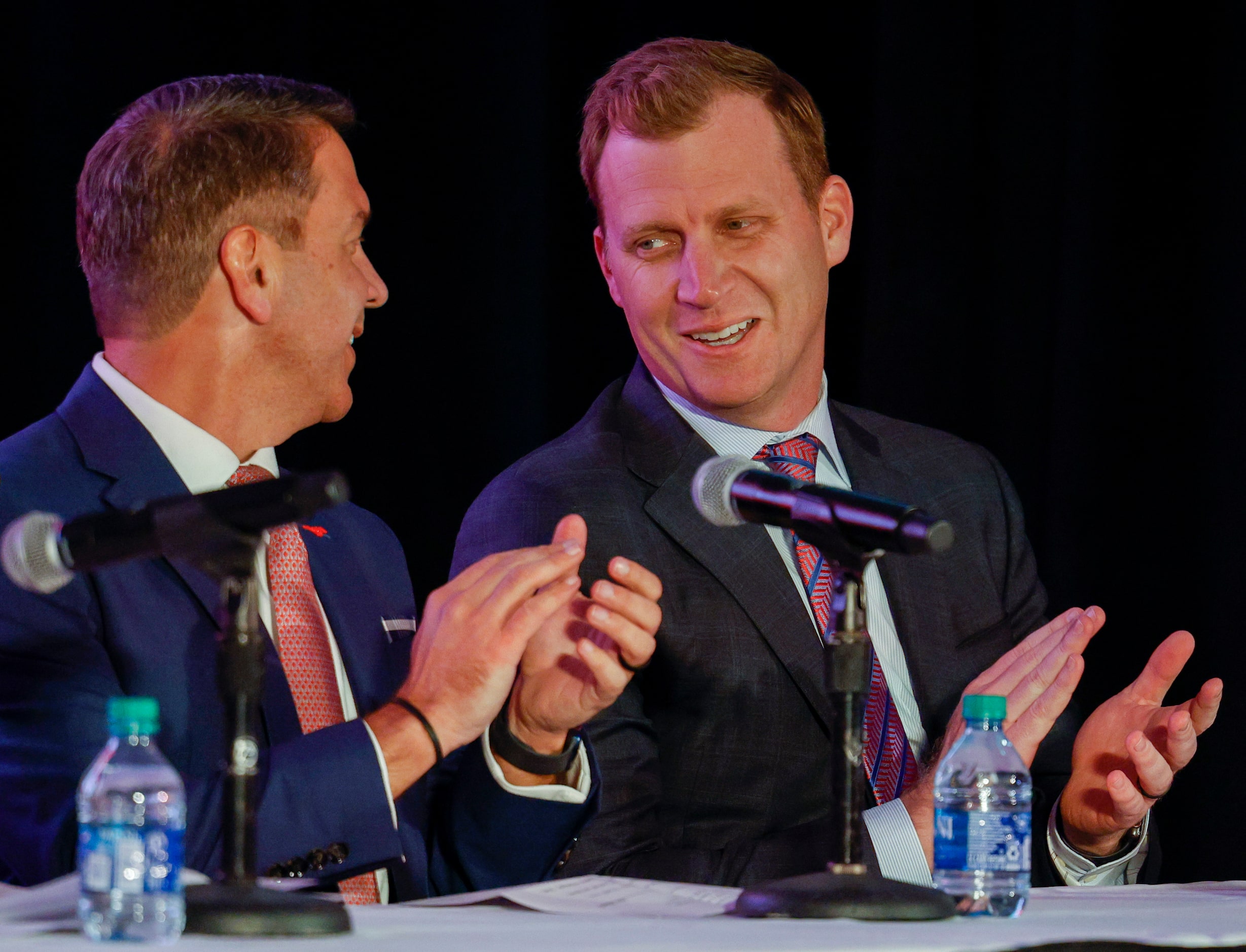 SMU athletic director Rick Hart (left) talks with SMU head football coach Rhett Lashlee...