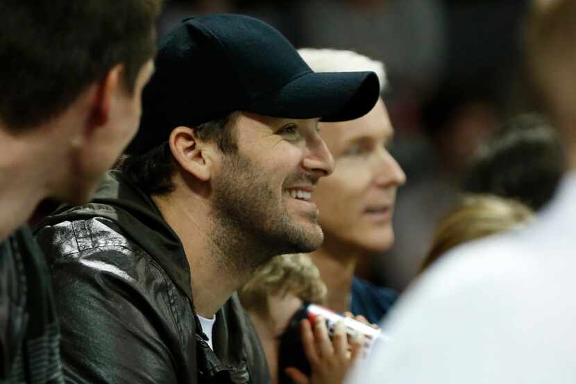 Dallas Cowboys quarterback Tony Romo watches a game between the Southern Methodist Mustangs...
