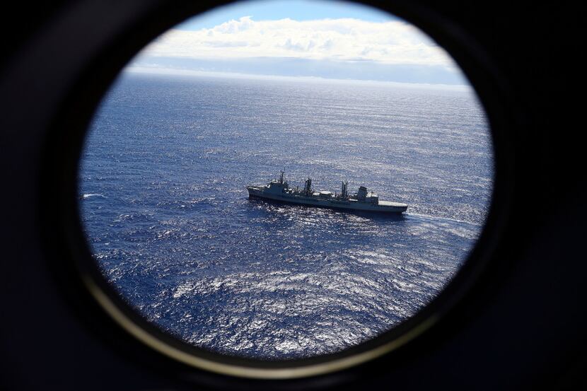 In this March 31, 2014 file photo, HMAS Success scans the southern Indian Ocean, near the...