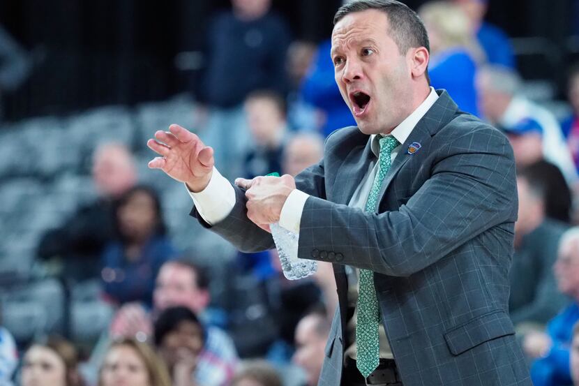 North Texas head coach Grant McCasland tells his team not to foul opponent, Louisiana Tech...