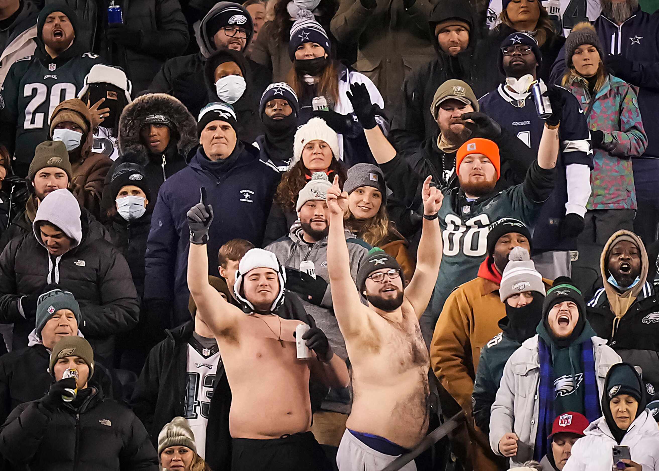 Shirtless Philadelphia Eagles fans cheer their defense during the second quarter of an NFL...