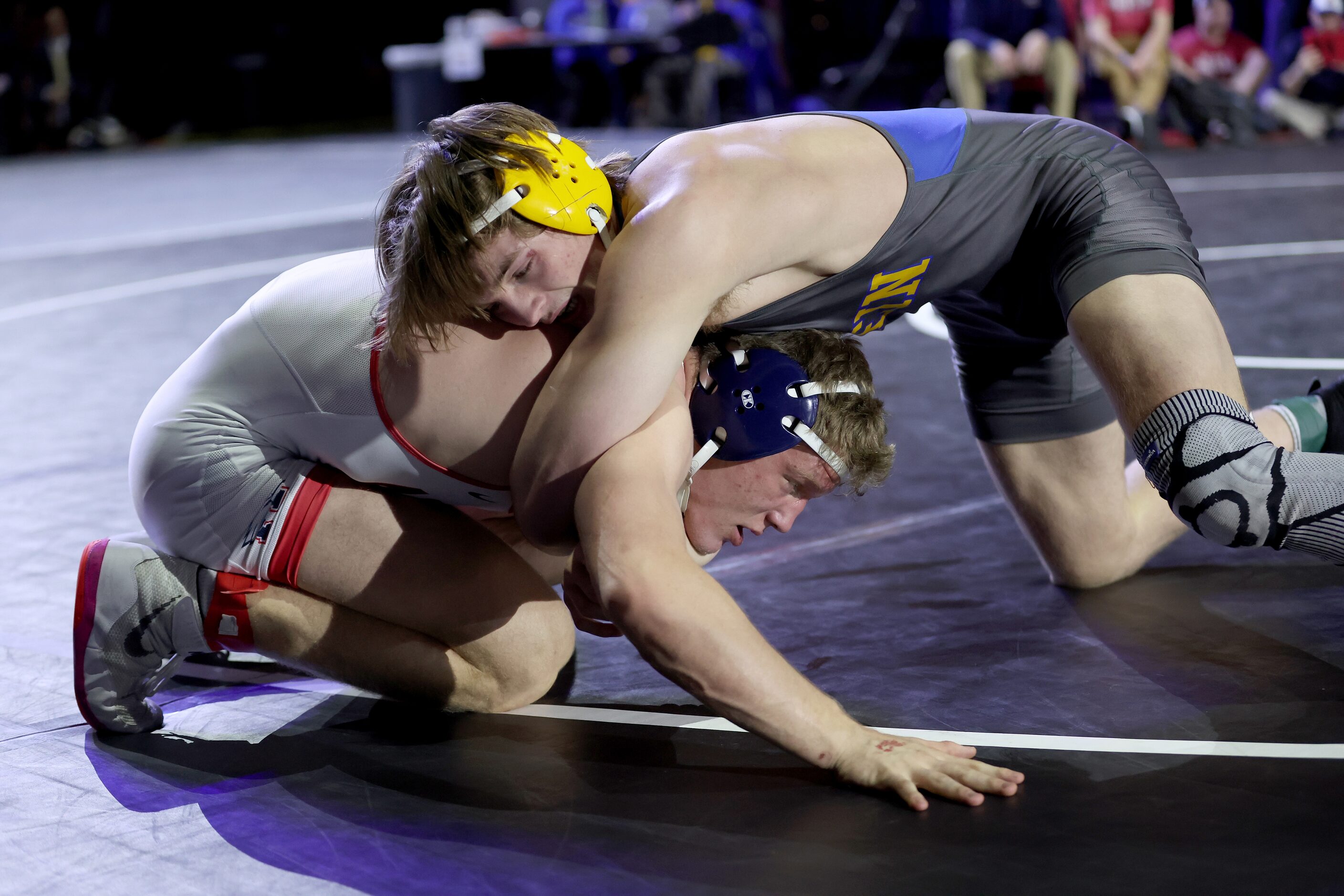 Aiden Cooley of Allen (white) competes against Isaac Sheeran of Klein during the Boys 6A...