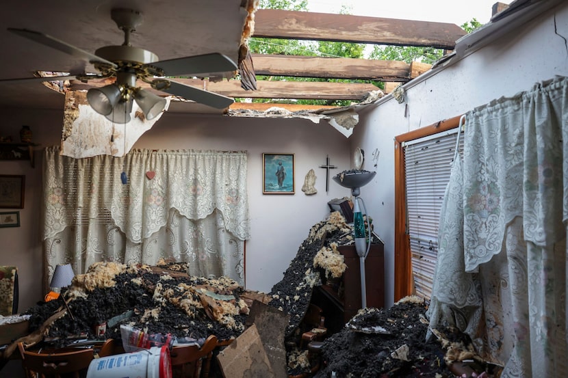 Damage is seen to Tom Jones' home after the roof blew off during a storm, Sunday, May 26,...