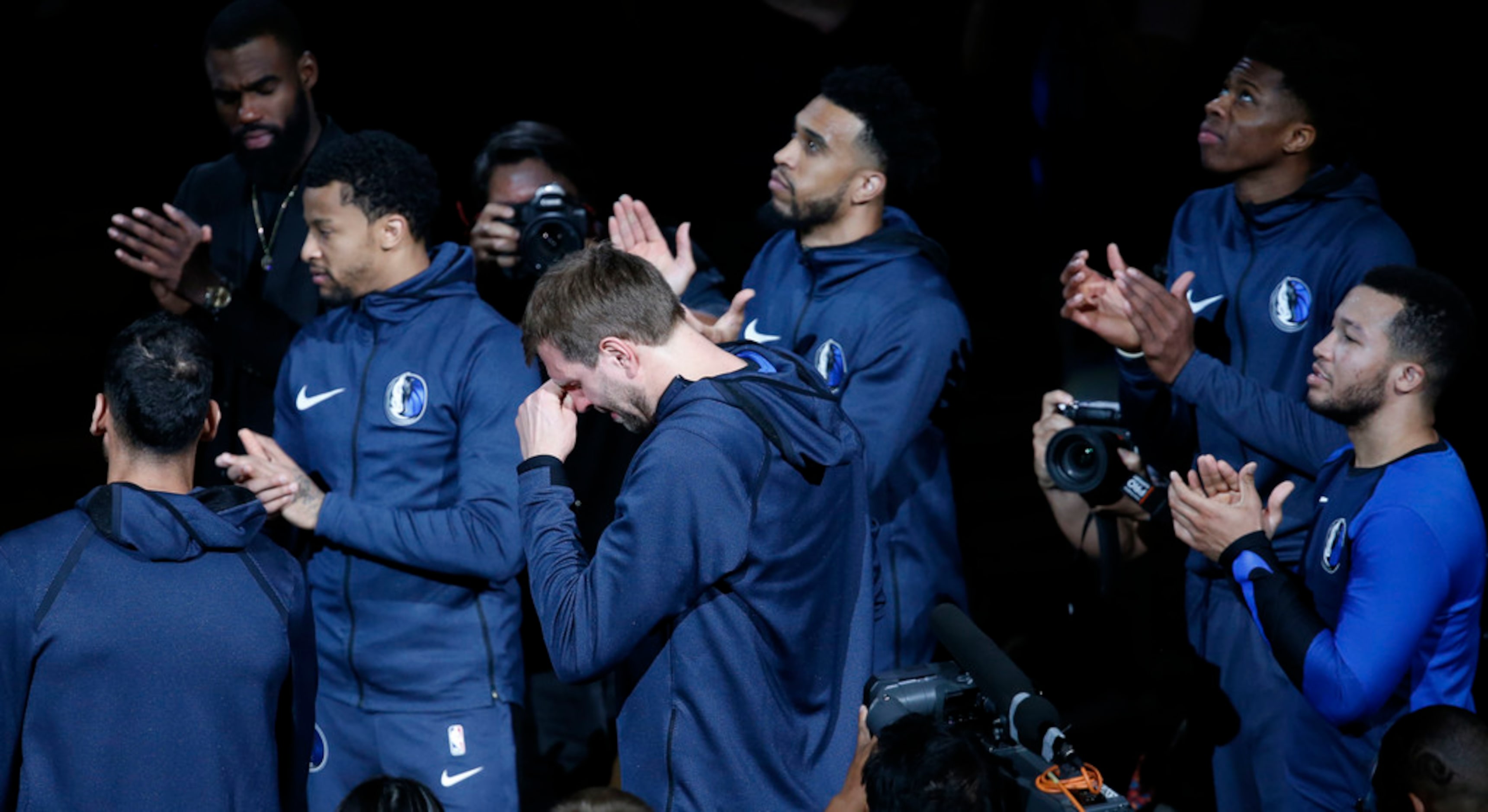 Dallas Mavericks forward Dirk Nowitzki (41) cries during a video tribute before the game...