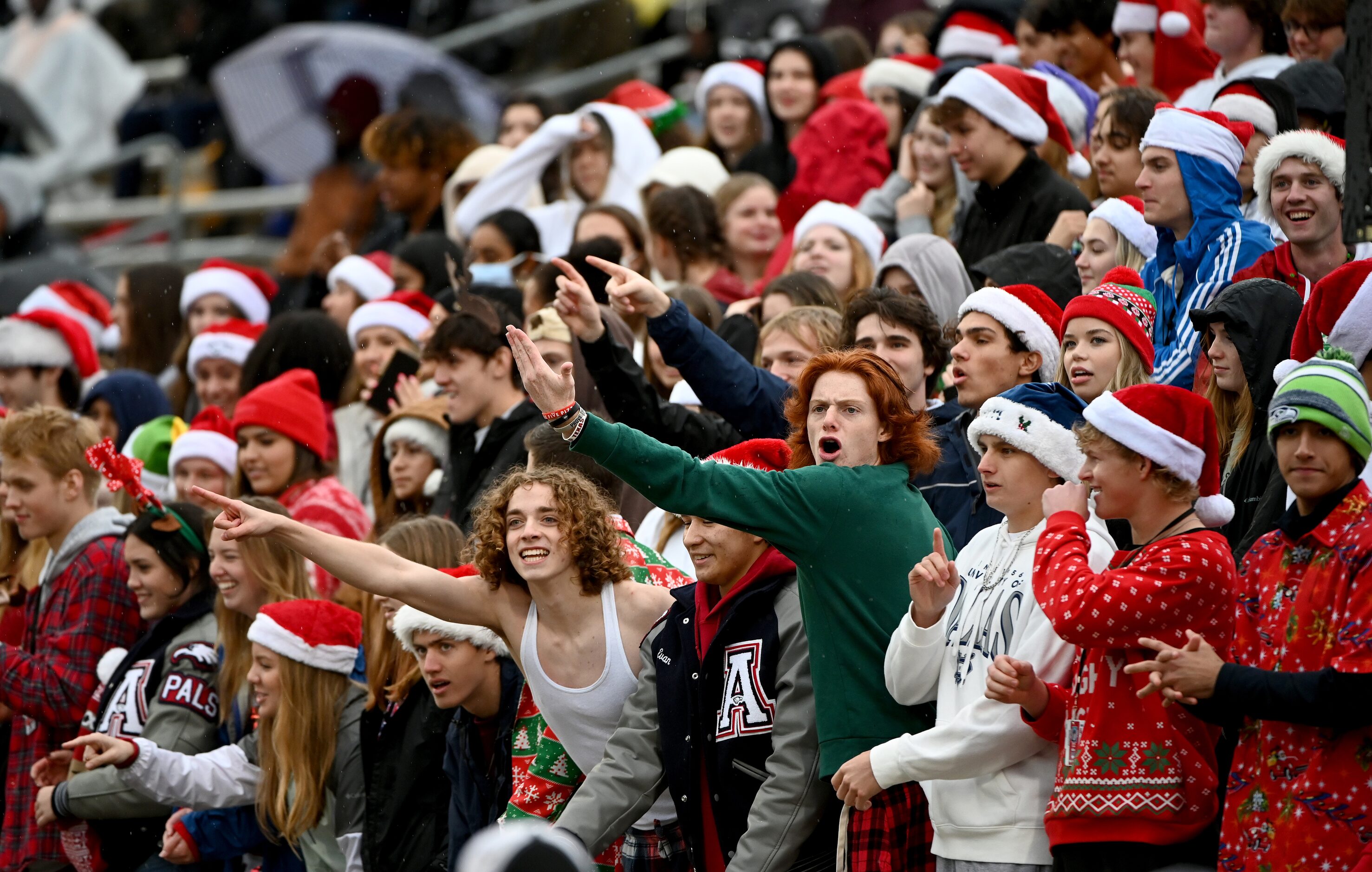 Allen students cheer in the first half of Class 6A Division I Region I semifinal playoff...