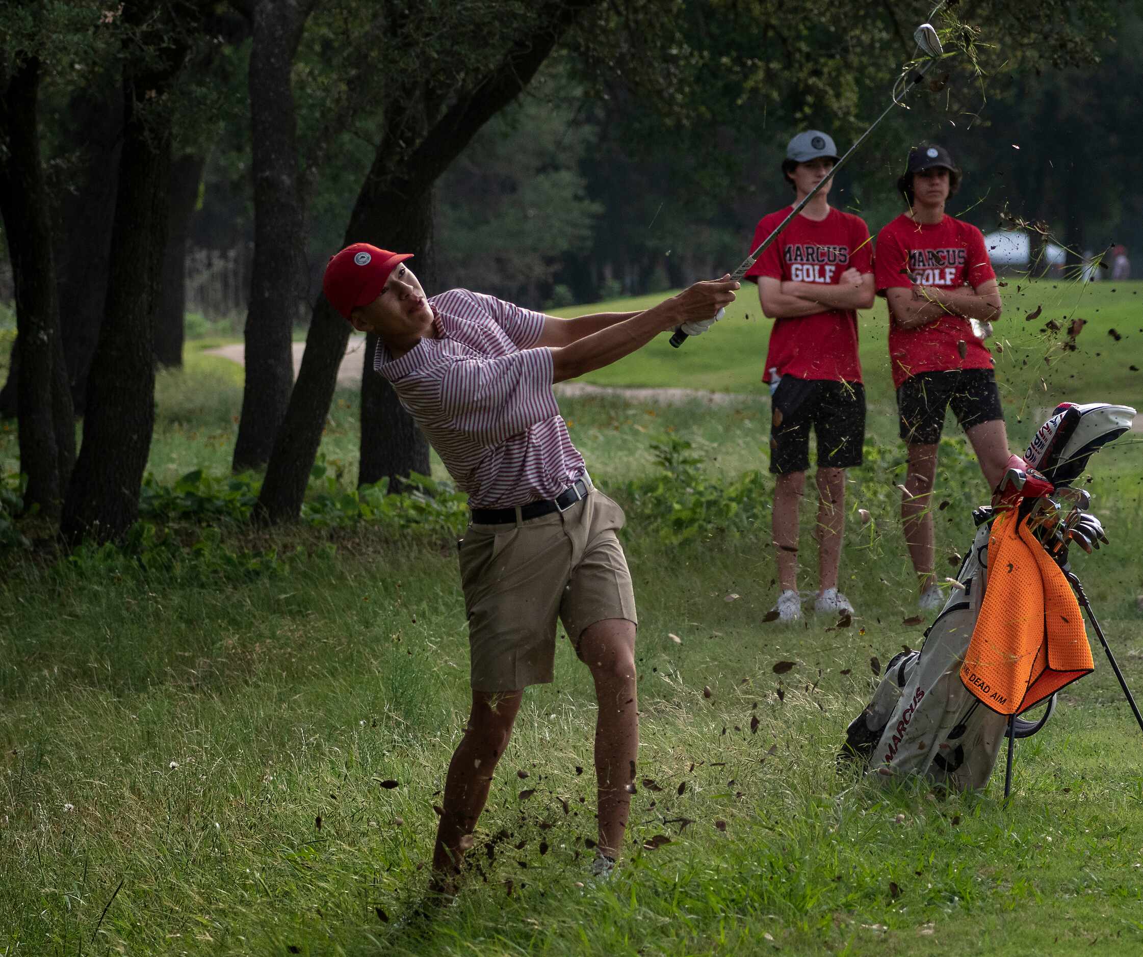 Flower Mound Marcus, Kenneth Melendrez hits out of the rough on the no.1 hole during the...