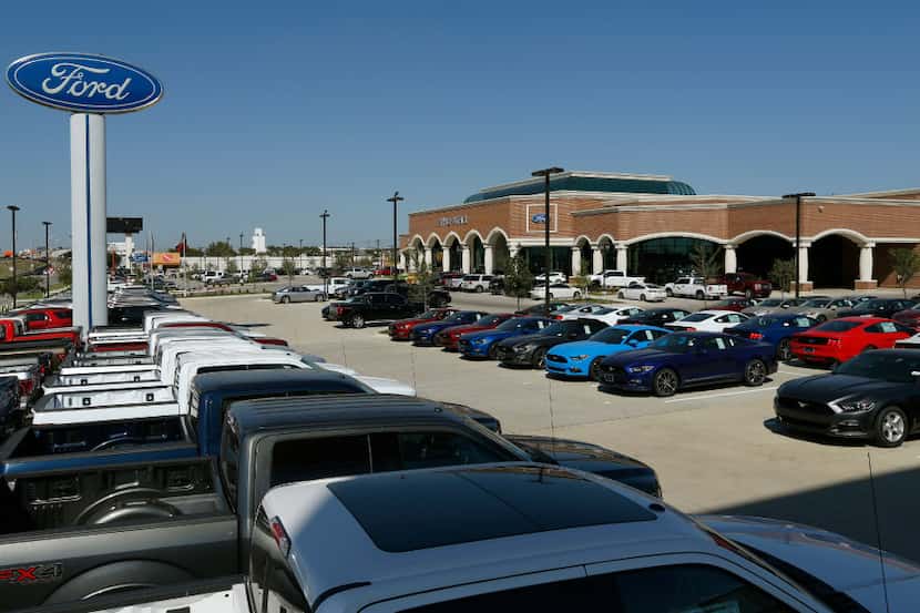 New cars and trucks on the lot at Five Star Ford in Carrollton.  (Nathan Hunsinger/The...