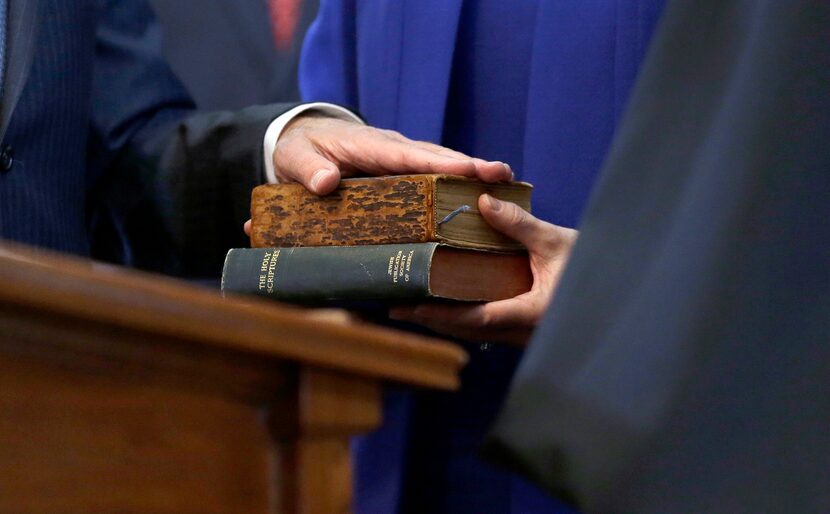 Texas State Rep. Joe Straus, R-San Antonio is sworn in as Speaker of the House with the Sam...