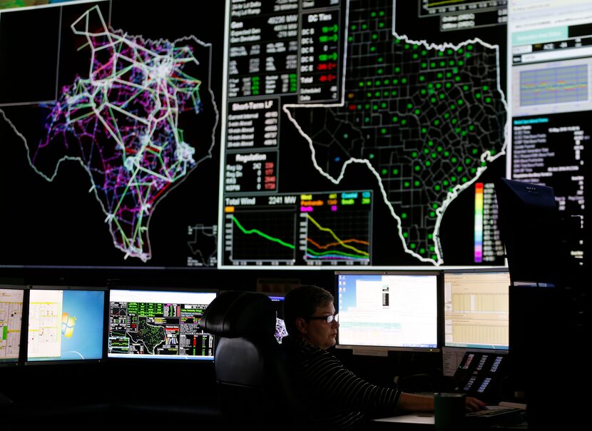 System operators work in the command center of the Electric Reliability Council of Texas in...