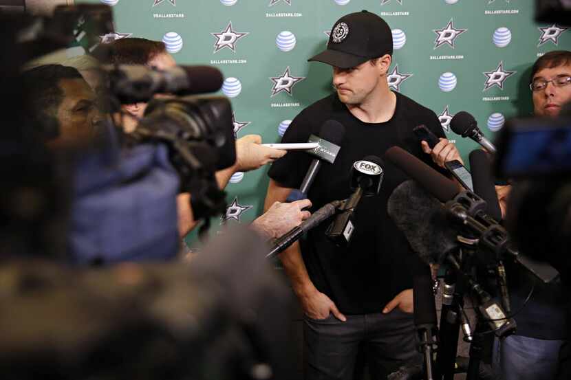Dallas Stars center Jamie Benn talks to media the team cleaned out their lockers at Dr...