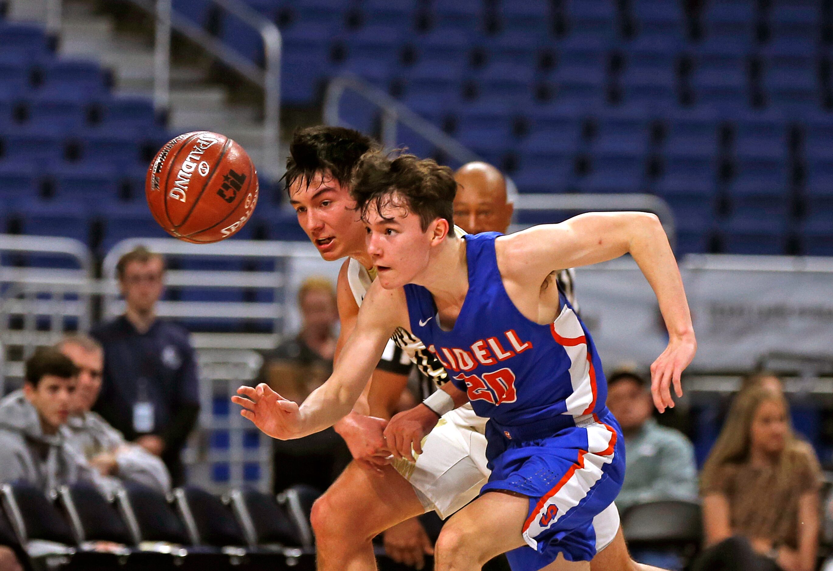 Slidell guard Tristyn Talamantes #20 steals the ball from Jayton guard Pecos Smith #15 in a...