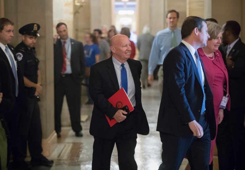 House Ways and Means Committee Chairman Kevin Brady, R-Texas, center, has pledged to...